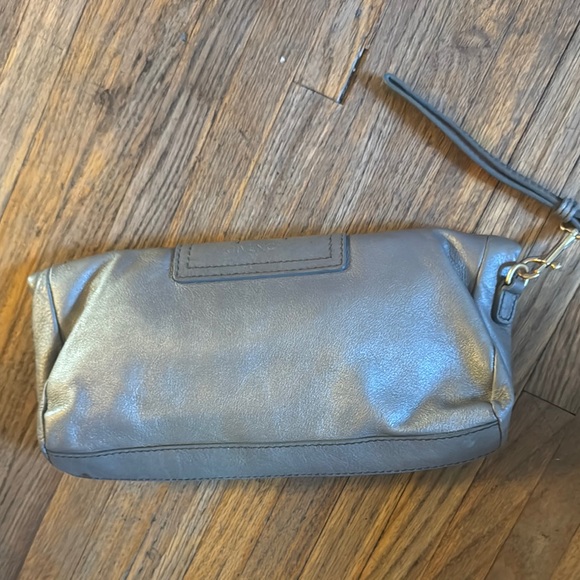 Givenchy  Stylish platinum leather Clutch with Gold Accents. - Picture 2 of 7